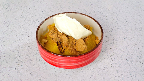 Charcoal cooked, rum pineapple with stem ginger and yoghurt